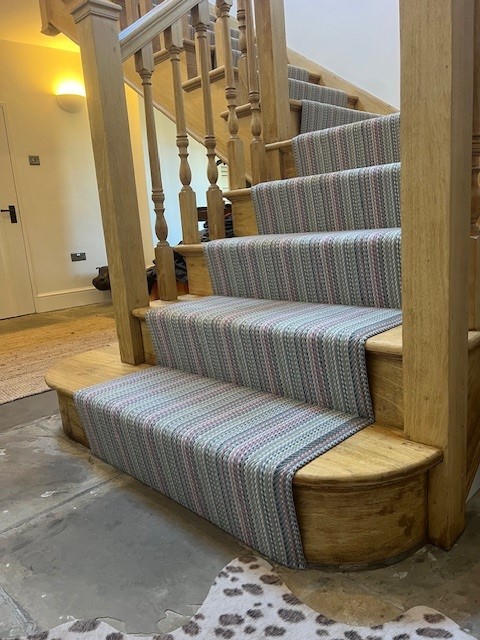 Roger Oates Venetian Flatweave stair runner on the curved bottom step by Select Line Swindon