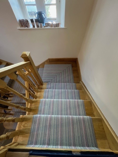 Roger Oates Venetian Flatweave stair runner detail on the half-landing by Select Line